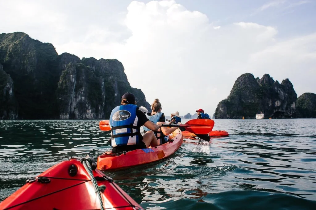 people in canoes